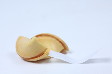 fortune cookie isolated on white background. Image contains copy space