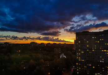 colorful orange sunset over the city, orange sky