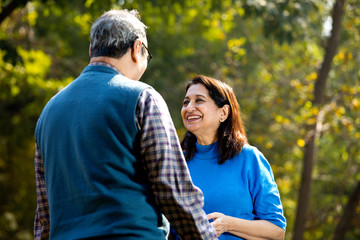 Laughing senior couple spending leisure time