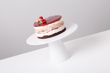 close up of conceptual fruit cake on gray background