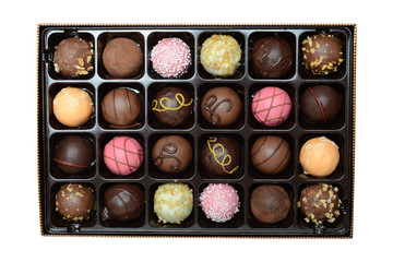 isolated assorted box of ball shaped chocolates