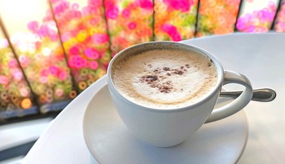 Cappuccino coffee served on a table in a coffee shop