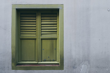 old wooden window on a wall