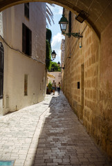 Obraz premium Street with colorful houses in old town of Ciutadella, Menorca, Balearic Islands, Spain, September, 2019