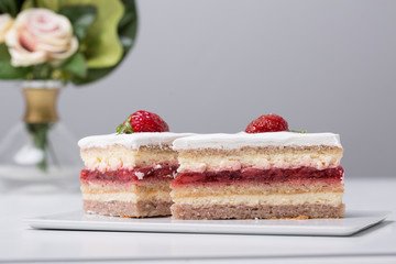 close up of conceptual fruit cake on gray background