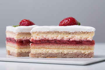 close up of conceptual fruit cake on gray background