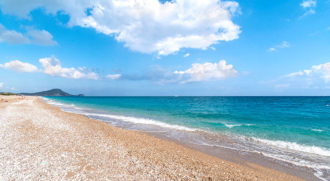 Panoramic view of Afandou beach near Faliraki, bluy sky, clouds, (Rhodes, Greece)