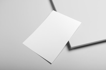 Real photo blank portrait A4, US-Letter, brochure magazine mockup isolated on gray background.