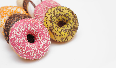 Delicious donuts on light background.