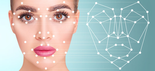 Beautiful woman with scnanning grid near her face.