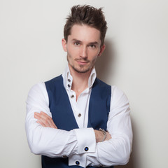 Handsome young elegant man studio portrait.