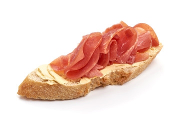 Italian prosciutto crudo sandwich, isolated on white background