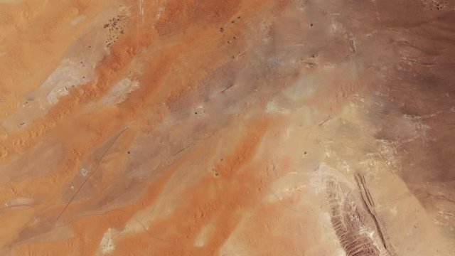 Urban sprawl aerial time lapse of Al Ain city in desert, United Emirates. Includes images furnished by Nasa