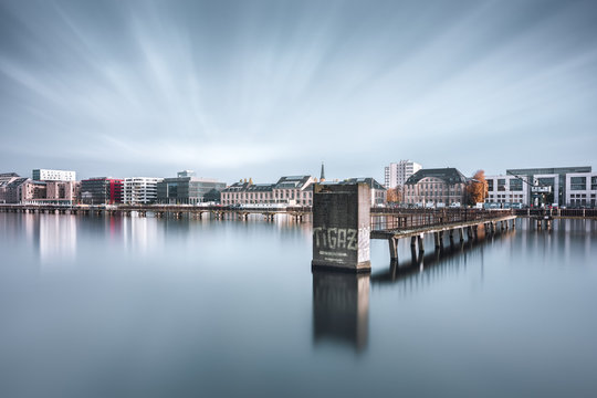 River With Built Structures In Distance