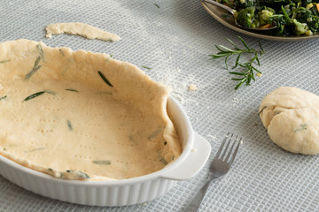 Cooking dough with fresh rosemary, homemade bakery themes, culinary and food concept