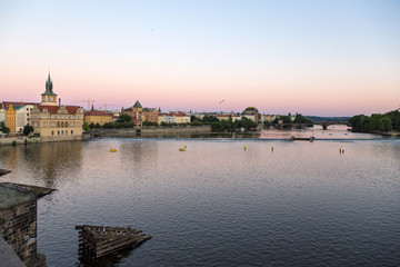 Prague and the Vltava river at sunset time