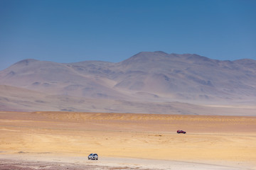 By Desert by Car, Paracas National Reserve, Peru. Car travel concept.