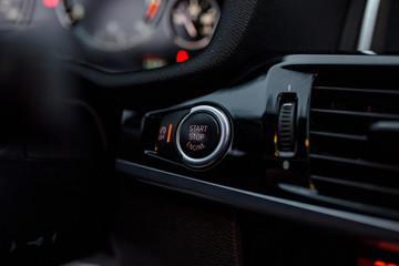 Fototapeta na wymiar Modern vehicles push start button.