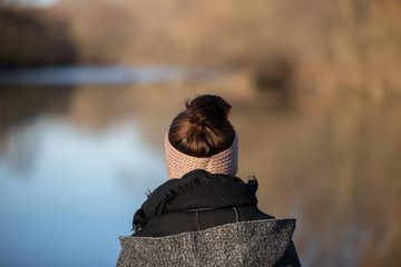 The Glance to the distance, Woman from behind at a river