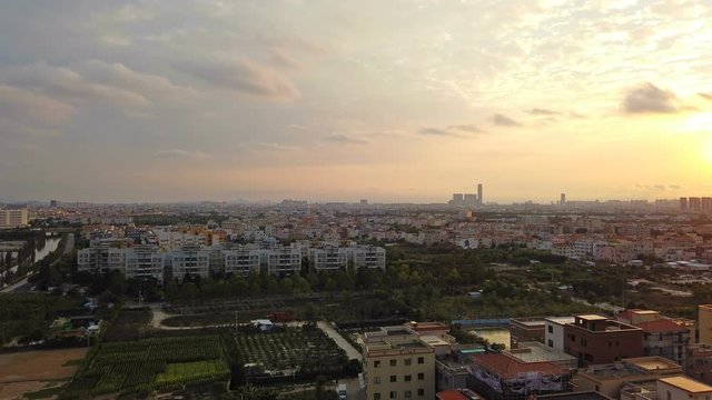 time lapse of a residential area in a Chinese suburb in sunset time