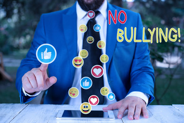 Writing note showing No Bullying. Business concept for stop aggressive behavior among children...