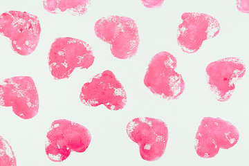 Pink heart prints on white canvas