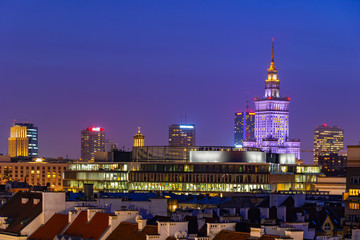 Obraz premium Warsaw City Skyline at Night in Poland