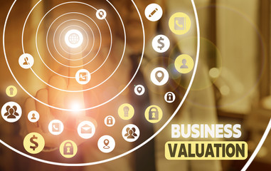 Conceptual hand writing showing Business Valuation. Concept meaning determining the economic value of a whole business
