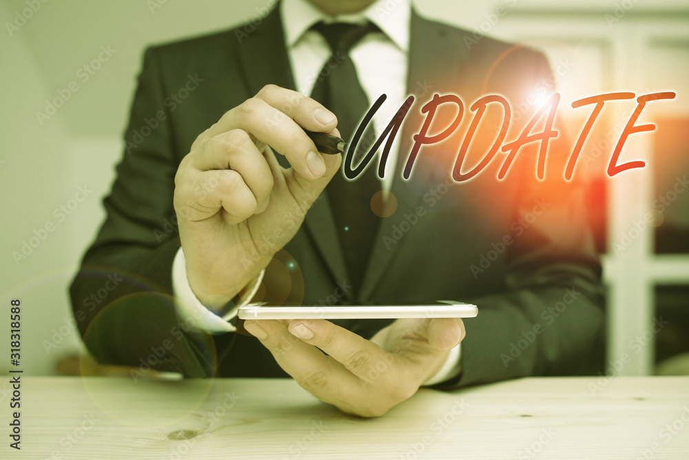 Wall mural text sign showing update. business photo showcasing by adding new information or making corrections 
