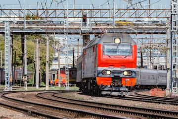 Fototapeta na wymiar Passenger train approaches to the station. Moscow. Russia.
