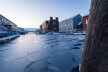 Sunrise in Portland, Maine - Coastal Pier during winter.