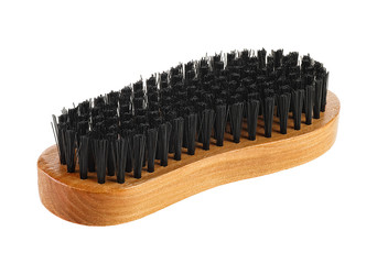 Wooden brush for cleaning clothes isolated on white background