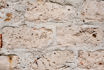 Old gray wall. brickwork masonry background, closeup