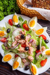 tuna salad on dark wooden rustic background