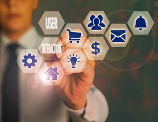 Conceptual hand writing showing User Interaction. Concept meaning the conduit between huanalysis and computer interaction