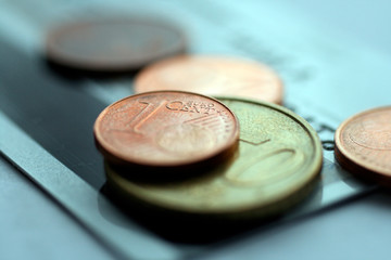 Euro cents on a credit card