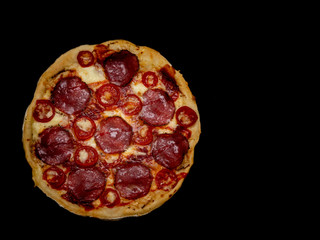 Pizza with salami and cheese. Top view. Free copy space.