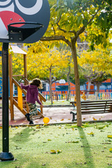 Little girl playing in park