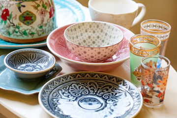 Collection of decorative tableware on the table