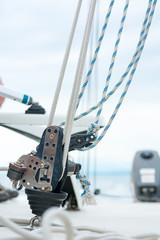 Hand winch on a sailboat while sailing.
