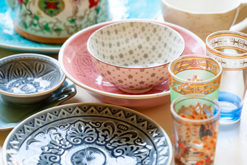 Collection of decorative tableware on the table - 318329757