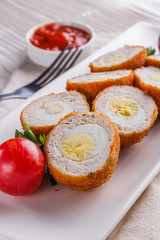 Scotch egg meat balls on rustic wooden background