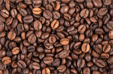 Beans of coffee background top view