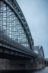 big gray bridge in cloudy weather