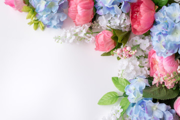 Flower frame, banner. Postcard with blue and pink flowers: hydrangea, peonies on a white background. Space for text