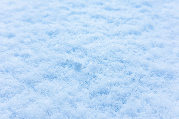 Obraz premium Bright white blue light snow macro winter texture