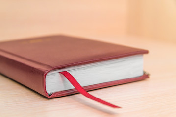 diary, Office Desk. Book layout blank leather case for magazine, booklet, brochure, diary, business portfolio layout design Template on a wooden background. business concept, diary and fountain pen