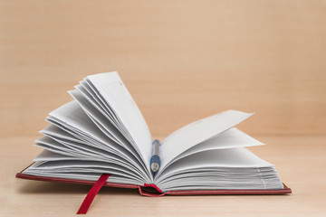 open diary with pen, notebook. business and planning concept