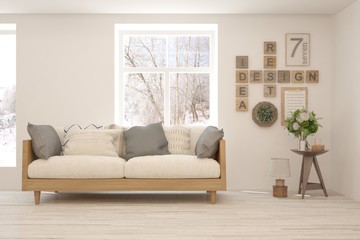 Stylish room in white color with sofa and winter landscape in window. Scandinavian interior design. 3D illustration