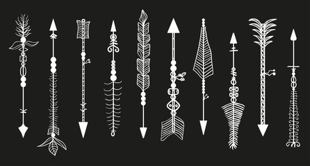 Bow arrows on black. Set of different rustic arrows with tribal ornaments. Black and white illustration